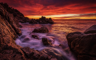 Red sky ocean rocks water - rock and water free wallpaper