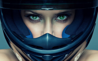 Woman green eyes motorcycle helmet - a black helmet free wallpaper