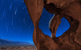 Rock formation star trail mountains - a rock formation free wallpaper