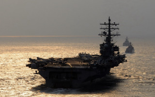 Large ship ocean military water - a smaller ship in the background free wallpaper