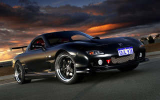 Black sports car sunset cloudy - andrew bell free wallpaper