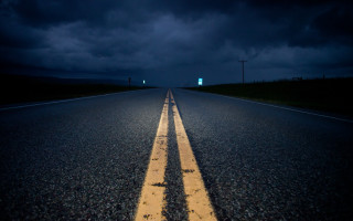 Night road yellow line dark - a dark sky in the background free wallpaper