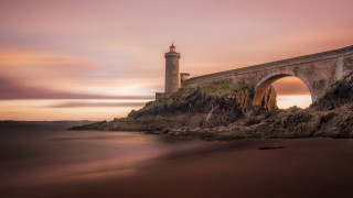 Lighthouse rocky cliff bridge sunset - a rocky cliff free wallpaper