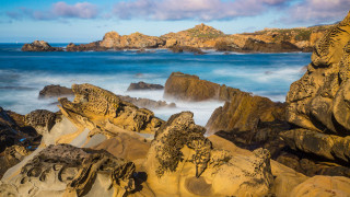 Rocky beach water bridge island - a few rock free wallpaper