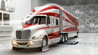 Semi truck parked white wall - a large room free wallpaper for desktop