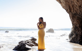 Woman yellow dress beach rock - a yellow dress free wallpaper