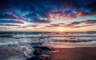 Sunset ocean waves beach dusk - the beach in the distance free wallpaper