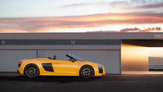 Yellow sports car garage sunset - a garage door free wallpaper