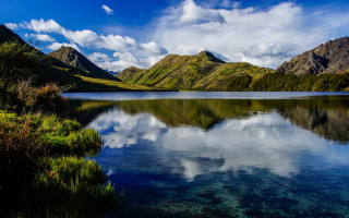 Lake mountains grass cloudy sky 7 - ada hill walker free wallpaper