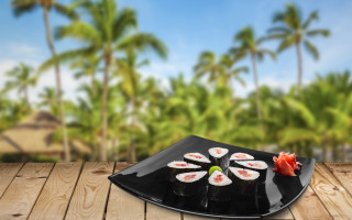 Black plate sushi wooden table - food photography free wallpaper