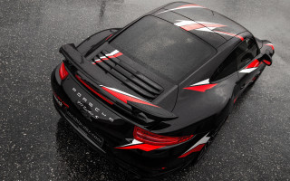 Black sports car red white - a wet surface free wallpaper