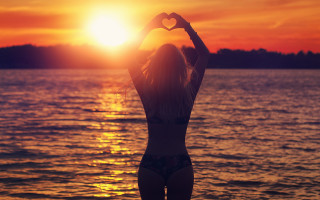 Beach sunset woman bikini silhouette - a woman in a bikini free wallpaper for desktop