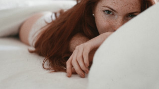 Eszter freckled hair bed portrait - hair free wallpaper