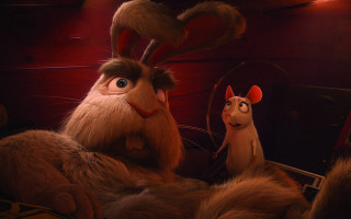 Stuffed animals bed red walls - a bed in a room free wallpaper