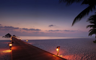 Pier lights night beach hut - dreamlike free wallpaper for desktop