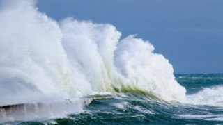 Large wave crashing break wall - stormy weather free wallpaper for desktop
