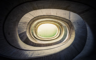 Spiral staircase window skylight concrete - a window in the middle of it free wallpaper