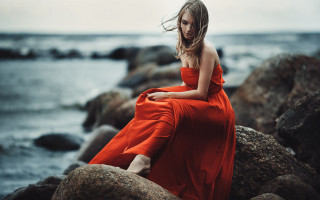 Woman red dress ocean rock 2 - artur tarnowski free wallpaper
