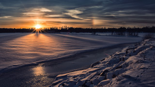 Sunset frozen lake trees sky - a sunset over a free wallpaper