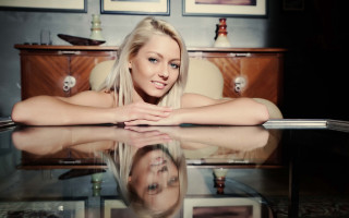 Woman blonde sitting smiling mirror - a picture in a room free wallpaper for desktop