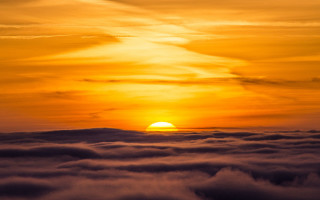 Sunset clouds plane sky horizon - the sun in the distance free wallpaper