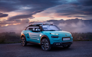 Blue car gravel road mountains - photoreal free wallpaper for desktop