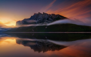 Mountain reflection sunset clouds cityscape - symmetrical balance free wallpaper for desktop