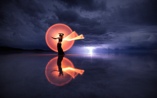 Woman orange object beach night - surreal photography free wallpaper for desktop