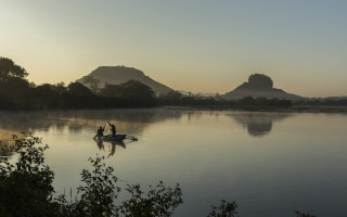 Man boat lake mountains sunset - dai xi free wallpaper for desktop