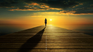 Pier sunset backlit illustration ocean - the sun setting behind them free wallpaper for desktop