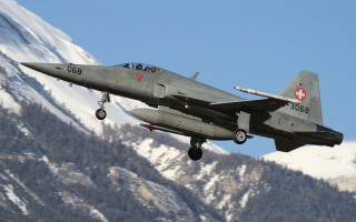 Military jet mountain cross plane - a red cross free wallpaper