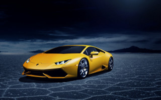 Yellow sports car desert night - a full moon in the sky above free wallpaper