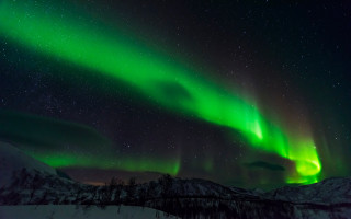 Aurora borealis mountain snowy night - the sky above a mountain range free wallpaper