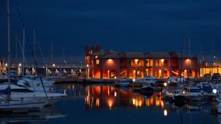 Marina boats night citylights building - a marina free wallpaper