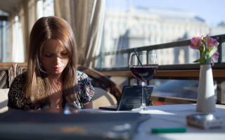 Woman sitting table wine phone - a cell phone in front free wallpaper for desktop