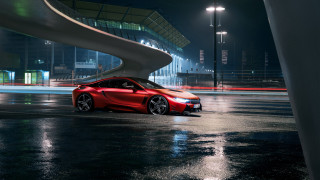 Red sports car night curved - the background and a street light in the foreground free wallpaper