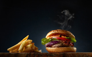 Burger fries smoke wooden table - a hamburger free wallpaper