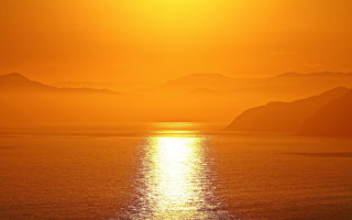 Sunset mountains ocean boat sky - sunrise time free wallpaper for desktop