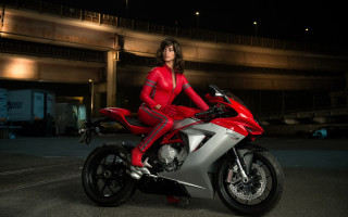 Afrofuturism woman motorcycle parking lot - a red outfit free wallpaper for desktop