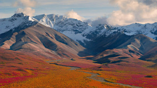 Mountain range winding road snow - mountain in the background free wallpaper