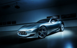 Silver maserato dimly lit spotlight - a spotlight free wallpaper