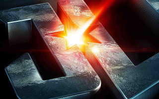 Metal star red light hologram - a close up of a metal object free wallpaper