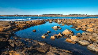 Rocky beach lighthouse puzzle sky - a rocky beach free wallpaper