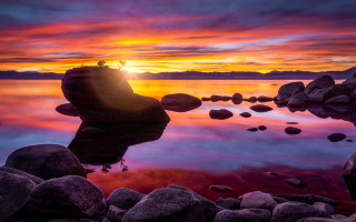 Sunset lake rocks water person - rock and water free wallpaper