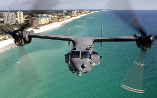 Military plane beach ocean buildings - anne dunn free wallpaper