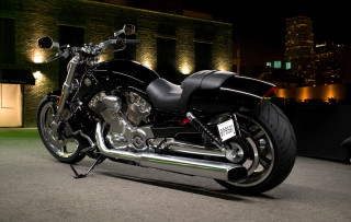Black motorcycle night building lights - the side of it free wallpaper