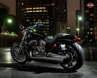 Motorcycle parked parking lot night - dark background free wallpaper