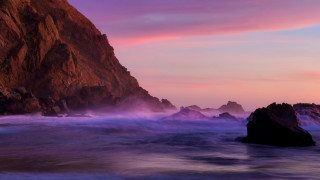 Mystical rocks pink purple blue - a pink sky in the background free wallpaper
