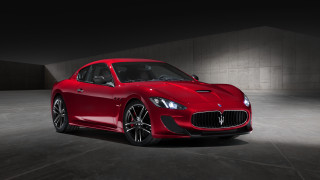 Red sports car dark room 95 - a spotlight free wallpaper
