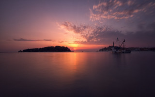 Boat sunset clouds cityscape mountains - a boat free wallpaper for desktop